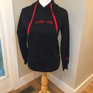 Black hoodie with Chinese words on front